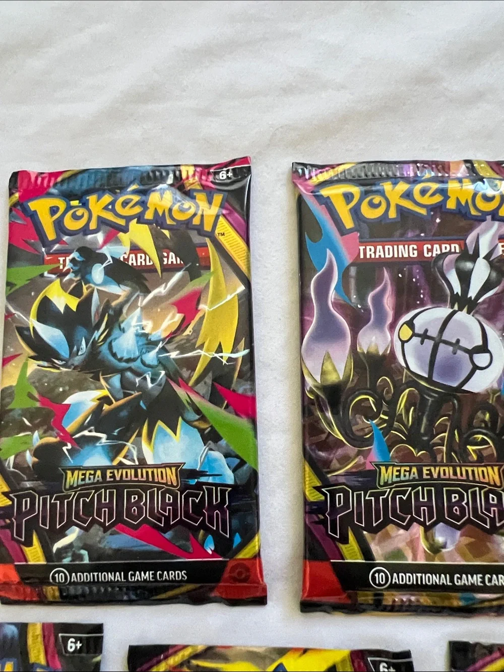 Pokemon Pitch Black Trading Card Booster Packs - Black, Purple, Yellow, Red